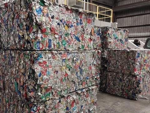 large bales of recyclables in a warehouse